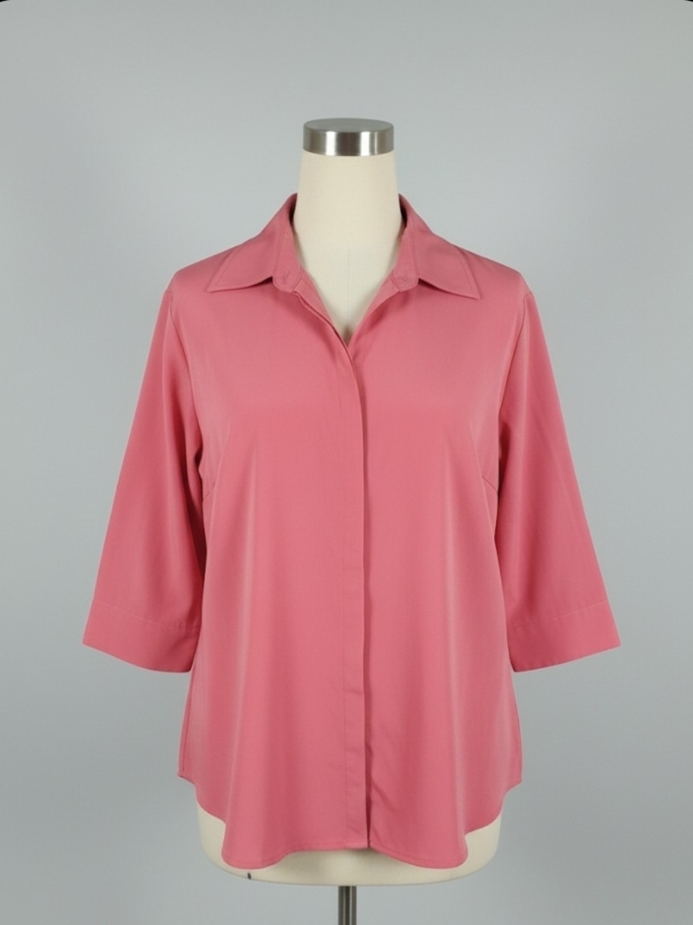 Pink silk blouse with short sleeves and button-up front